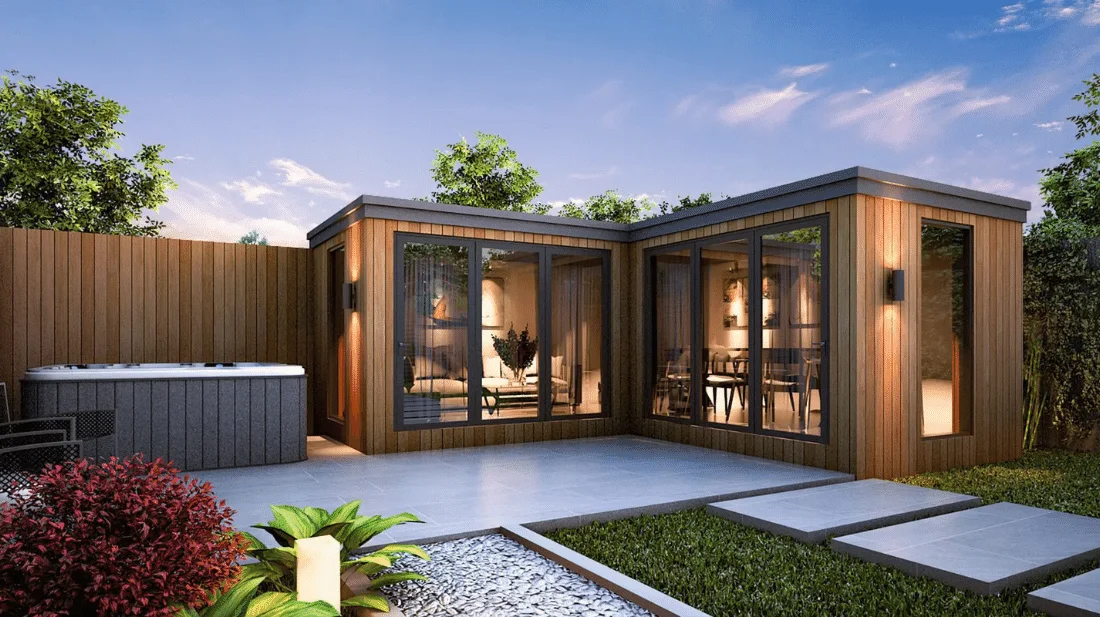 A deluxe wooden outdoor garden room with a patio and a jacuzzi